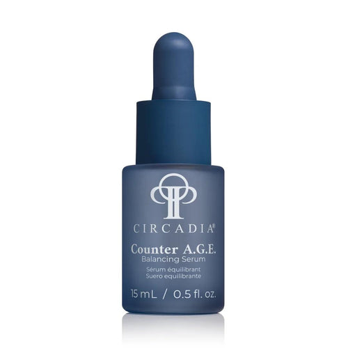 Flesje van Circadia Counter A.G.E. Balancing Serum 15 ml met een zilveren en witte verpakking en een pipet.
