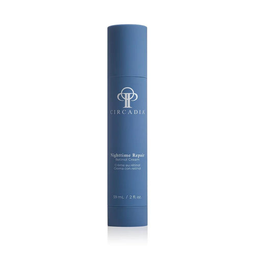 Witte pompflacon van Circadia Nighttime Repair 59 ml met donkerblauwe en zilveren details.